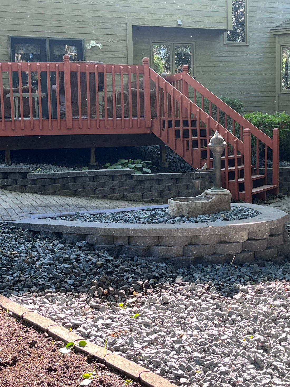 Finished backyard makeover and fountain restoration by Elzo Landscape in Elk River Minnesota
